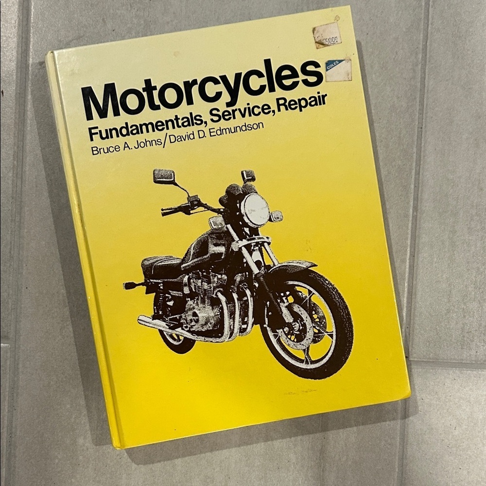 Yellow Motorcycle Repair Book